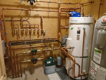 120 gallon buffer connected to a radiant floor heating system and 2 air to water heat pumps.