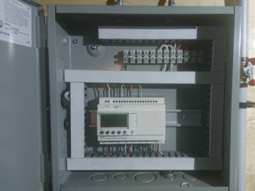 PLC controller operating an air to water heat pump that heat DHW, radiant floors and a air handler that provides cooling in the summer. The heat pump will also heat the future hot tub.