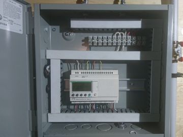 PLC controller operating an air to water heat pump that heat DHW, radiant floors and a air handler that provides cooling in the summer. The heat pump will also heat the future hot tub.