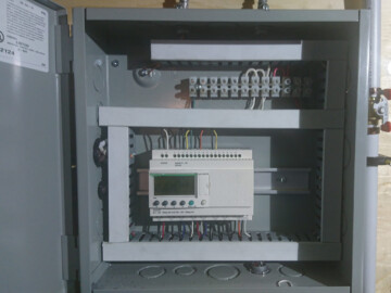 PLC controller operating an air to water heat pump that heat DHW, radiant floors and a air handler that provides cooling in the summer. The heat pump will also heat the future hot tub.