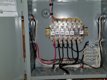 The system is a 5 ton geothermal Waterfurnace heat pump with five solar panels. The solar system will heat the house, domestic hot water and hot tub. When the solar is not enough the heat the water the heat pump automatically handles the loads. In the summer when there is to much heat being generated from the solar system the extra heat is dumped in the ground loop to be stored until it is needed.