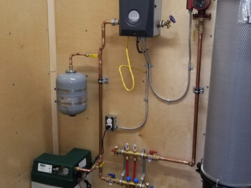 3kw electric boiler heating a radiant floor for a wood shop.
